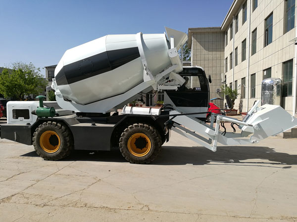 self loading concrete mixer machine